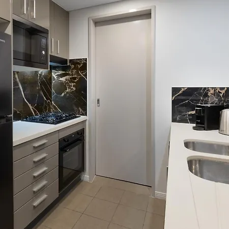 Meriton Suites Broadbeach Gold Coast Exterior photo A kitchen in a modern apartment